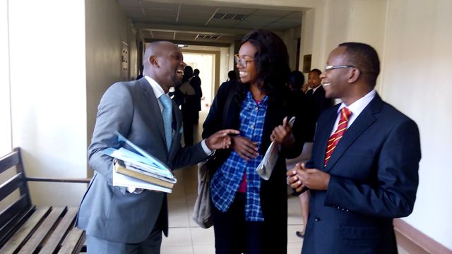 Audrey Mbugua with lawyer Stephen Mwanza Gachie for the human rights activist Solomon Gachira who filed a suit seeking orders to restrain the Attorney General from implementing of two thirds gender rule until the transgender are included leaving Milimani law courts after  court directed the matter to be placed before CJ to appoint a bench.31 July,2015.